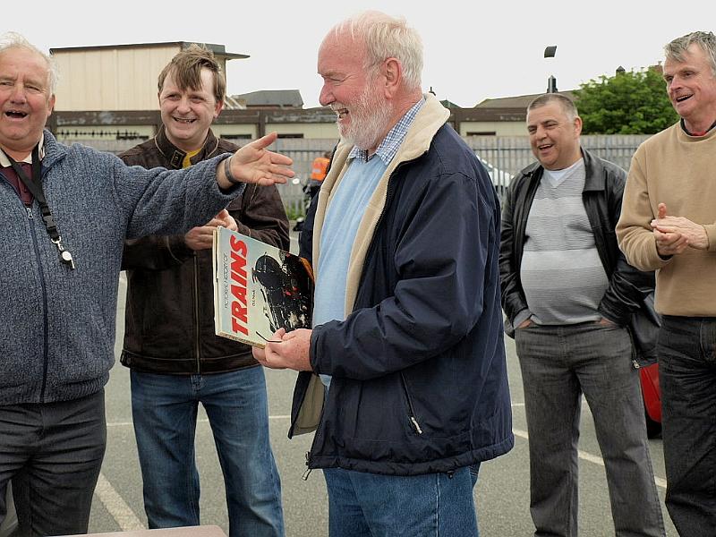 P5091757.JPG - former Mayor Mick Roberts present s Mike Townson with a book. Some more engines to read about